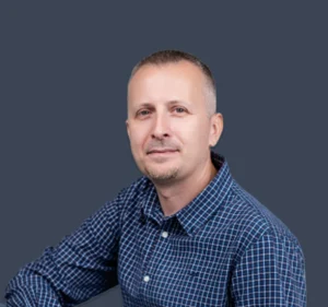 Portrait of Marcin Nabiałek in a professional pose